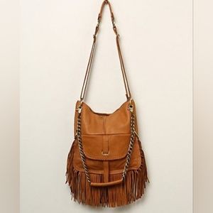 Leather “cut n paste” boho purse.